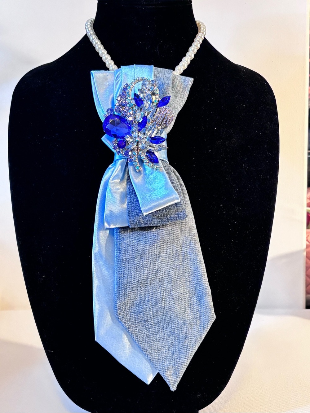 Pearl Necklace with Light Blue Satin Bow and Royal Blue Crystal Brooch